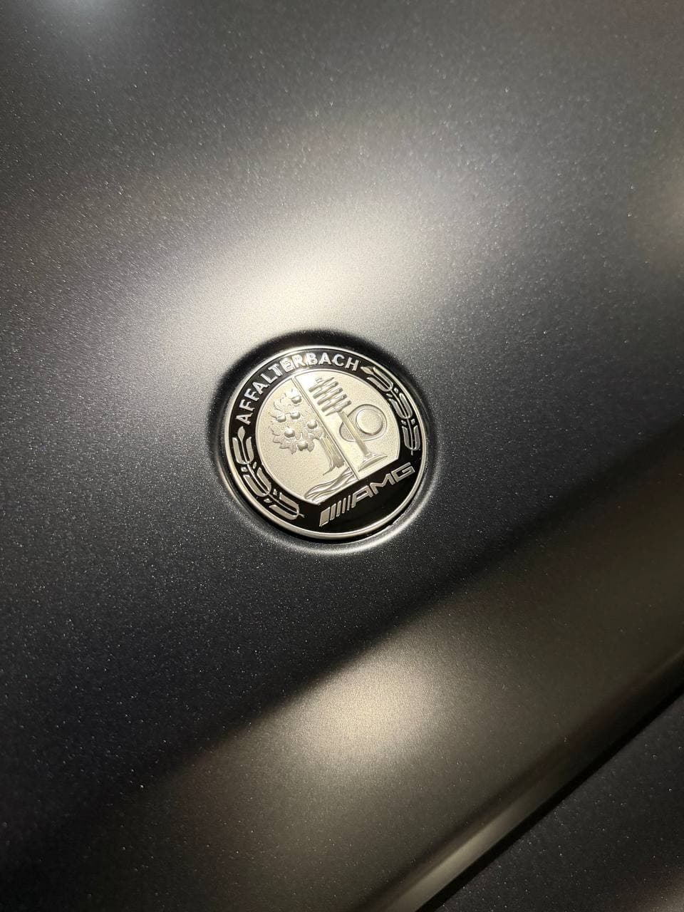 Mercedes-AMG Affalterbach hood badge close-up