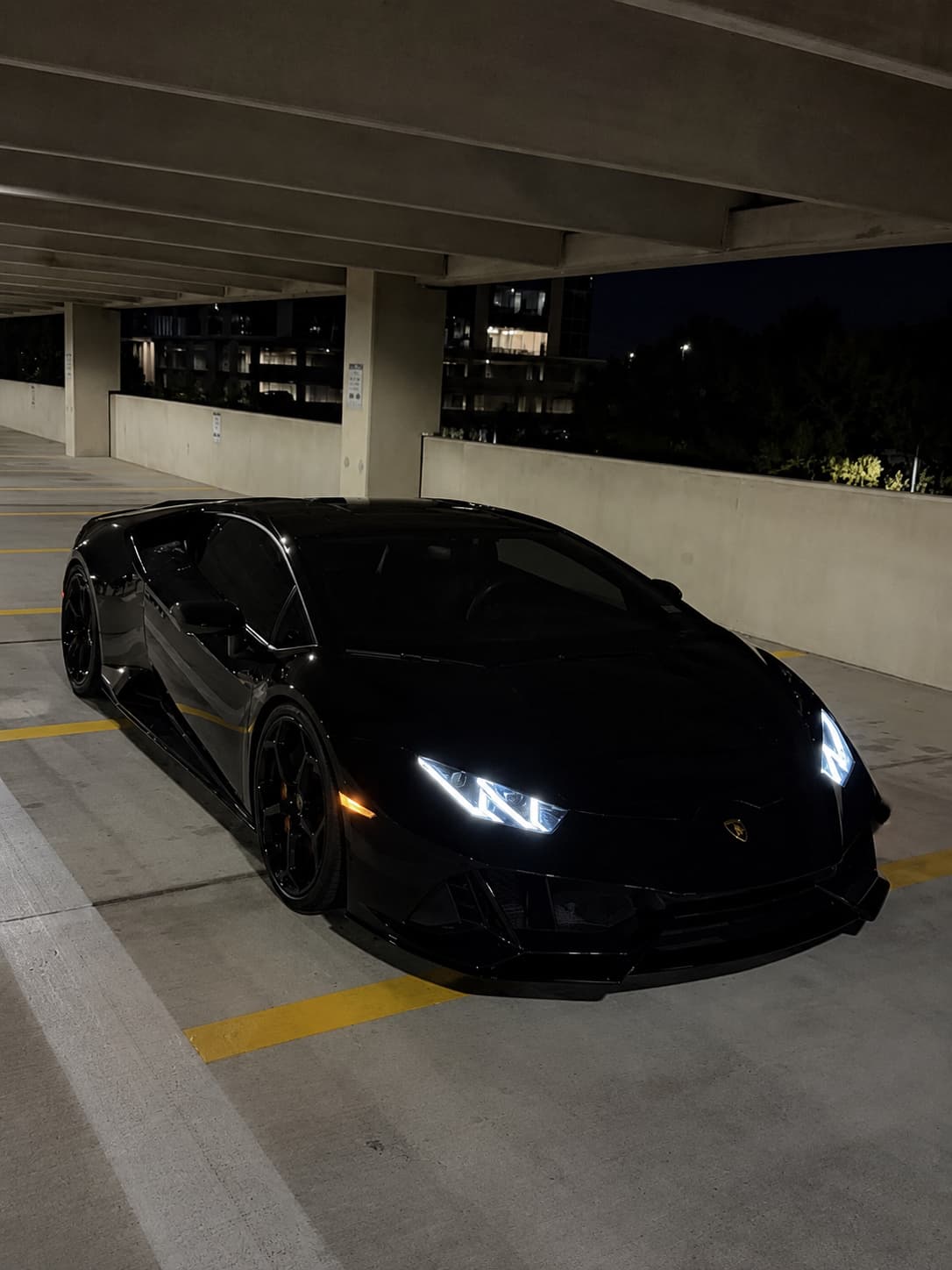 Black Lamborghini after a DETAILX Chicago detail at night.