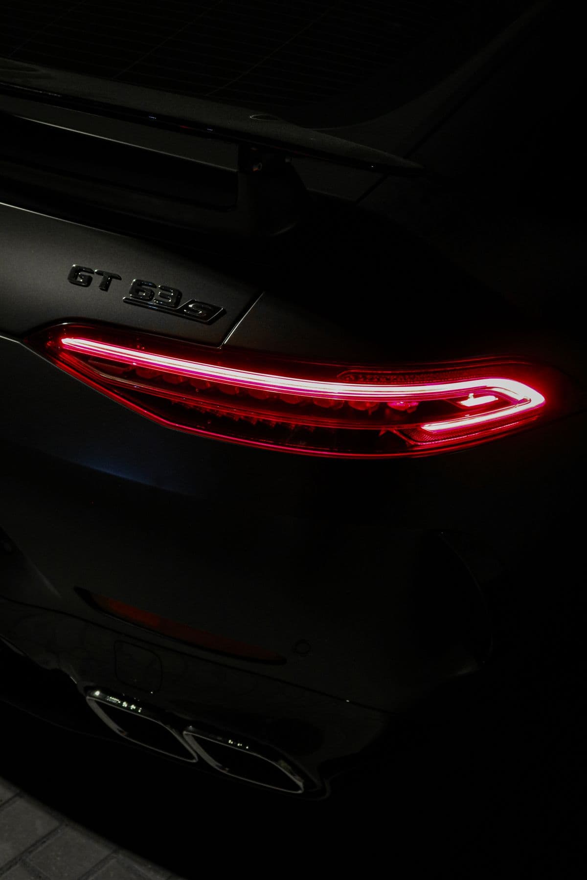 Mercedes tail light and rear panel after a DETAILX Chicago detail.